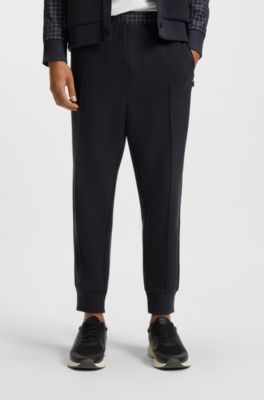 Pantaloni della tuta in piqu&eacute; elasticizzato con stampa a quadri, Blu scuro