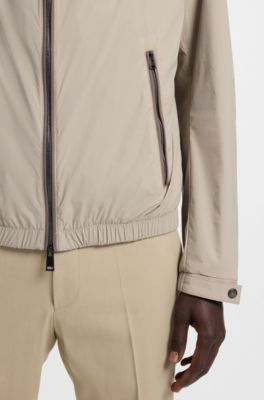 Wasserabweisender Windbreaker mit verstaubarer Kapuze, Beige