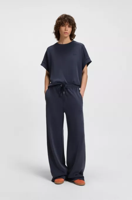 Relaxed-fit tracksuit bottoms with embroidered logo