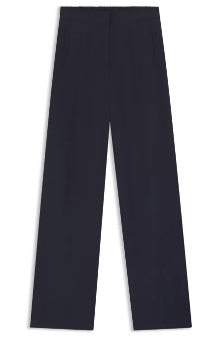 Formal trousers with pleat details