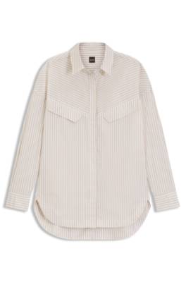 Oversized-fit blouse in striped cotton 1