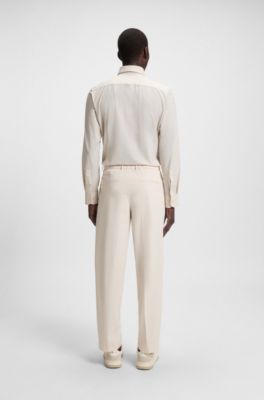 Relaxed-fit trousers in water-repellent stretch fabric, White