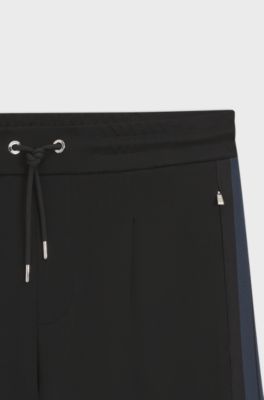 Porsche x BOSS tracksuit bottoms with side stripes, Black