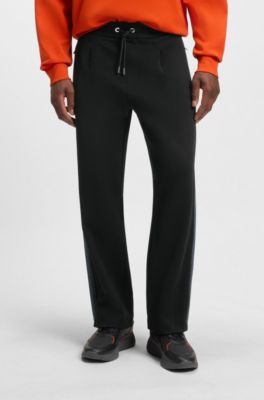 Porsche x BOSS tracksuit bottoms with side stripes, Black