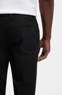 Slim-Fit Hose aus Vier-Wege-Stretch-Gewebe, Schwarz