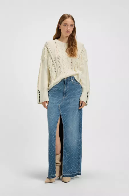 Cotton-blend sweater with cabling and fringing
