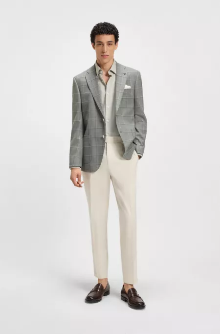 Machine-washable tapered-fit trousers in stretch fabric