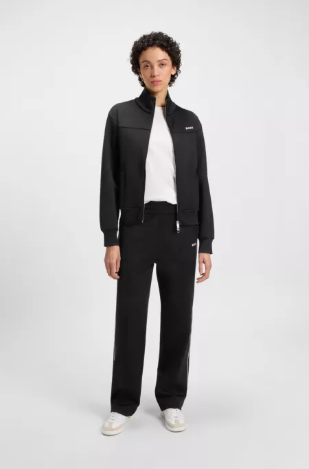 Straight-fit tracksuit bottoms with contrast logo and piping