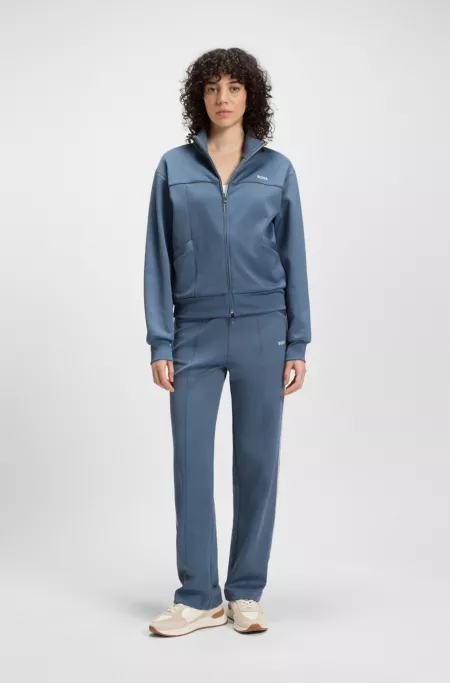 Straight-fit tracksuit bottoms with contrast logo and piping