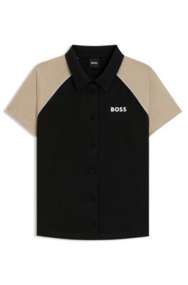 Active Top mit Jacquard-Monogrammen und Knopfleiste, Schwarz / Beige