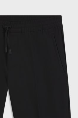 Wasserabweisende Hose aus leichtem, b&uuml;gelleichtem Gewebe, Schwarz