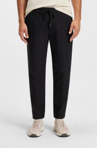 Pantalones repelentes al agua en tejido ligero de planchado fácil, Negro