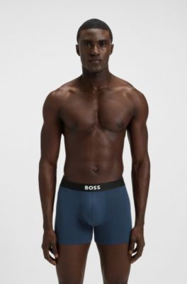 Dreierpack eng anliegende Boxershorts aus Stretch-Baumwolle, Blau / Rot / Schwarz