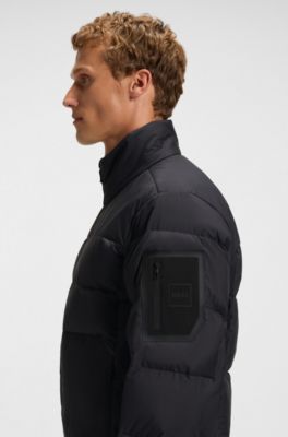Wasserabweisende Daunenjacke mit &Auml;rmeltasche, Dunkelblau