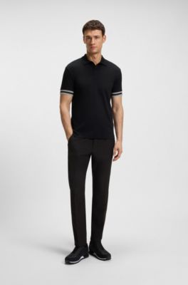 Slim-Fit Poloshirt aus Baumwolle mit gestreiften &Auml;rmelb&uuml;ndchen, Schwarz