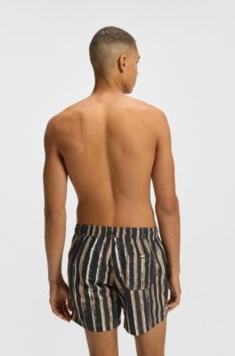 Quick-dry swim shorts with all-over print, Black / Beige