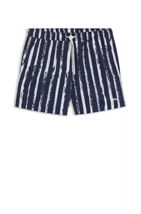 Quick-dry swim shorts with all-over print