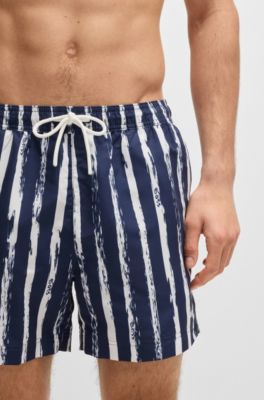 Quick-dry swim shorts with all-over print, Dark Blue