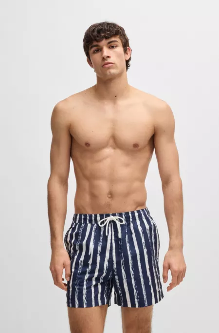 Printed swim shorts with logo detail