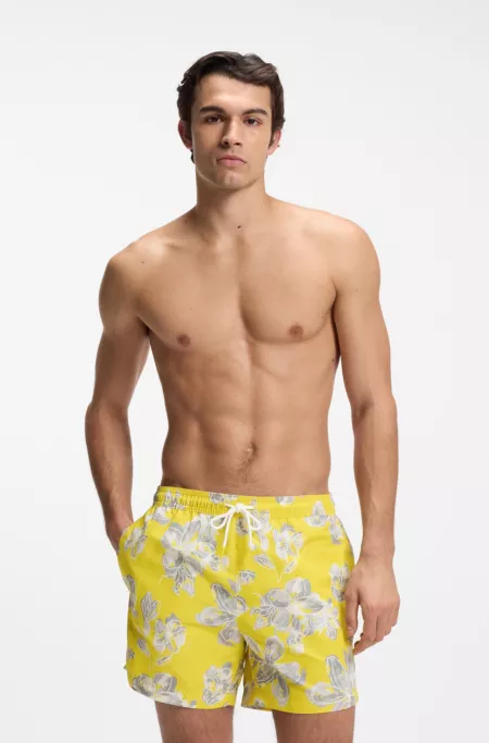 Quick-dry swim shorts with all-over print