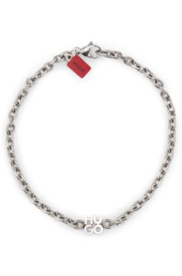 Chain cuff with stacked-logo plaque, Silver tone