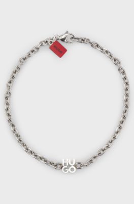 Chain cuff with stacked-logo plaque, Silver tone