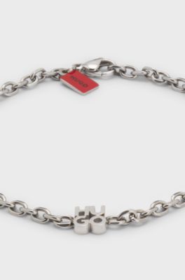 Chain cuff with stacked-logo plaque, Silver tone