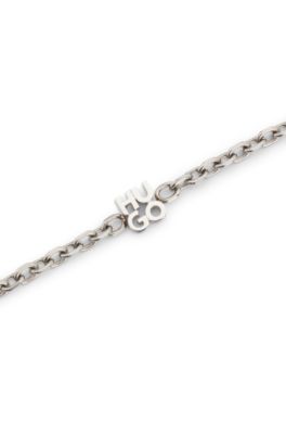 Chain cuff with stacked-logo plaque, Silver tone