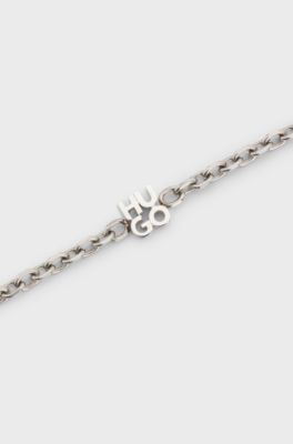 Chain cuff with stacked-logo plaque, Silver tone