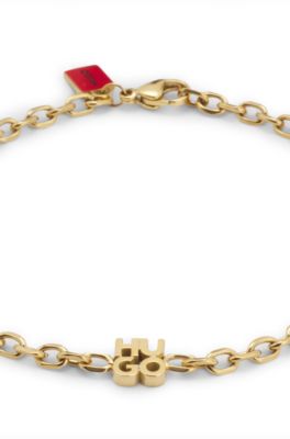 Chain cuff with stacked-logo plaque, Gold tone