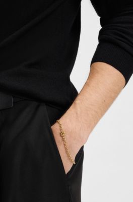 Chain cuff with stacked-logo plaque, Gold tone