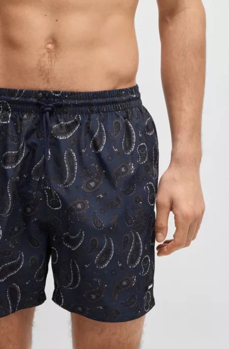 Short de bain à motif cachemire et logo en gomme