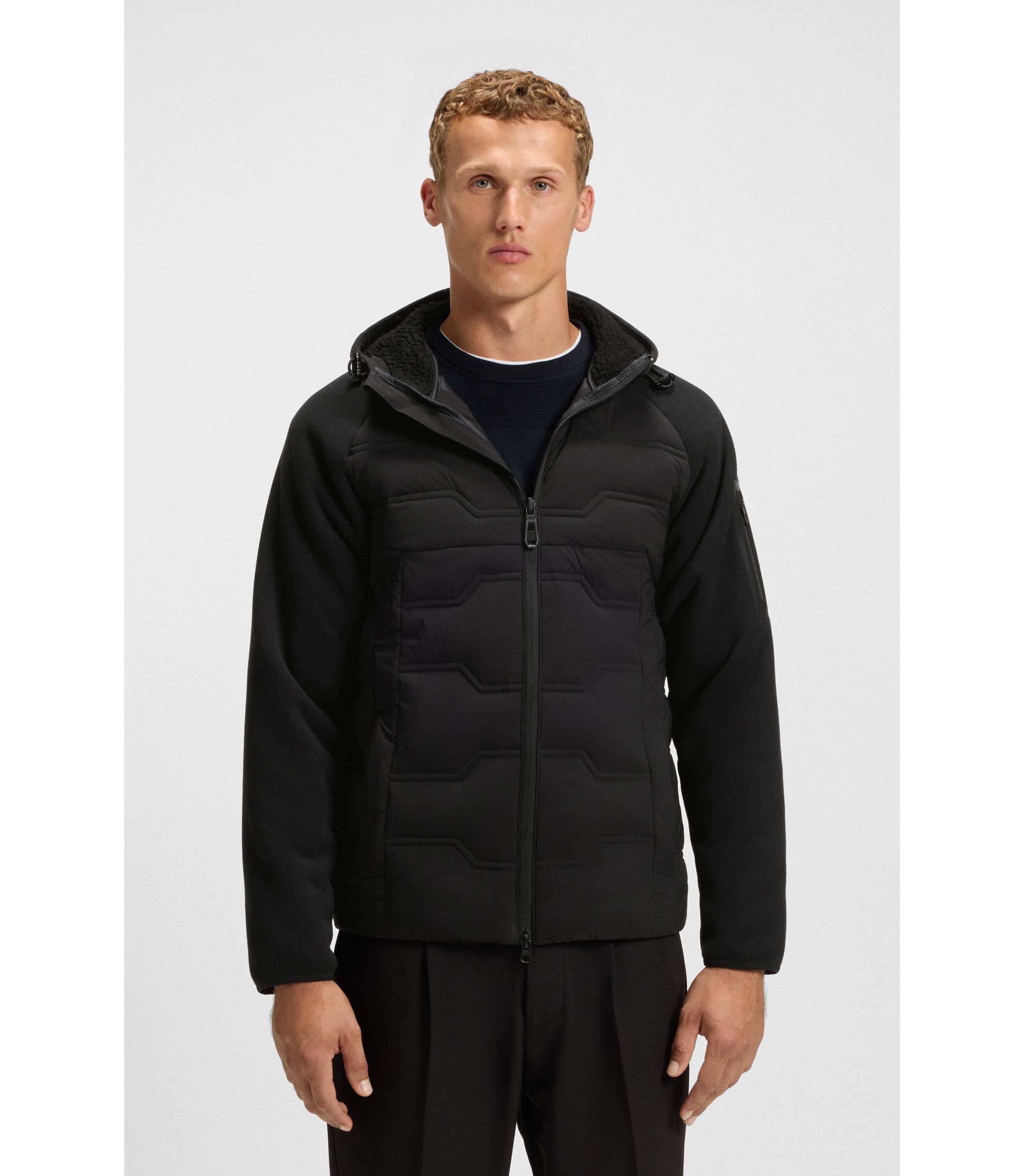 Wasserabweisende Hybrid-Jacke mit Teddy-Fleece und Steppmaterial