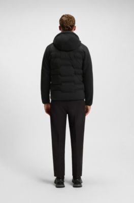 Wasserabweisende Hybrid-Jacke mit Teddy-Fleece und Steppmaterial, Schwarz