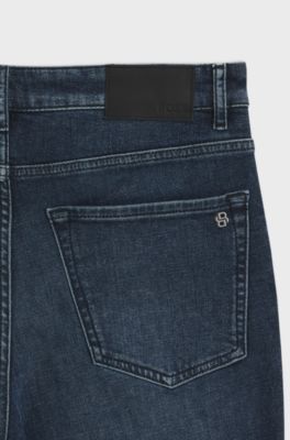 Jeans con fit affusolato in comodo denim elasticizzato blu, Blu scuro