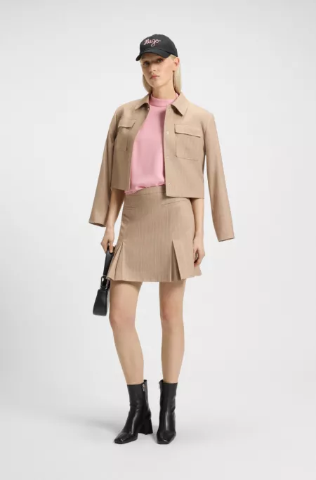 Haut en crêpe à encolure montante drapée