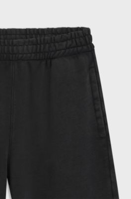 Loose-fit tracksuit bottoms in cotton terry, Black