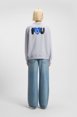 All-gender sweatshirt with Happy HUGO artwork, Light Grey