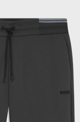 Cotton-blend tracksuit bottoms with striped waistband, Dark Grey
