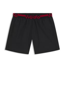 Swim shorts with split-logo waistband 1