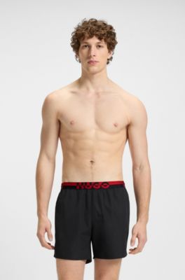 Boxer da mare con elastico in vita con logo spezzato, Nero
