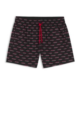 Swim shorts with all-over split-logo print 1