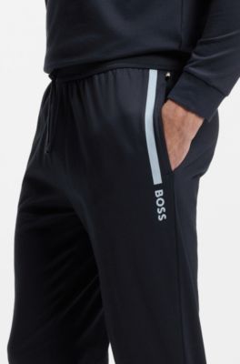 Tracksuit-bukser i sweatkvalitet af bomuld med logoprint, M&oslash;rkebl&aring;