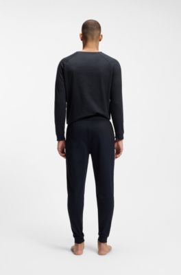 Tracksuit-bukser i sweatkvalitet af bomuld med logoprint, M&oslash;rkebl&aring;