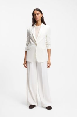 Wide-leg trousers in stretch fabric, White