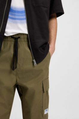 Relaxed-fit trousers in ripstop fabric, Olive