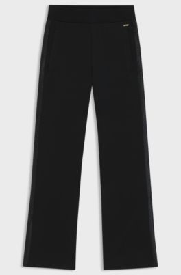 Tracksuit bottoms in piqu&eacute; jersey with monogram tape, Black