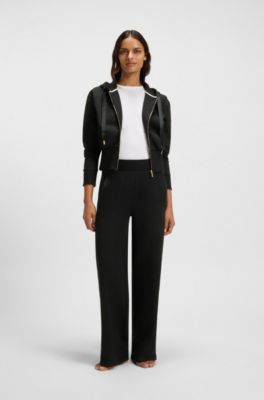 Tracksuit bottoms in piqu&eacute; jersey with monogram tape, Black