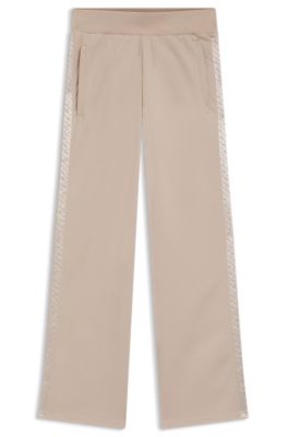 Tracksuit bottoms in piqu&eacute; jersey with monogram tape, Light Beige