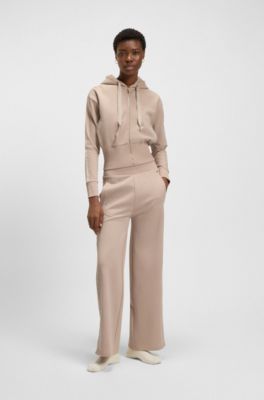 Tracksuit bottoms in piqu&eacute; jersey with monogram tape, Light Beige